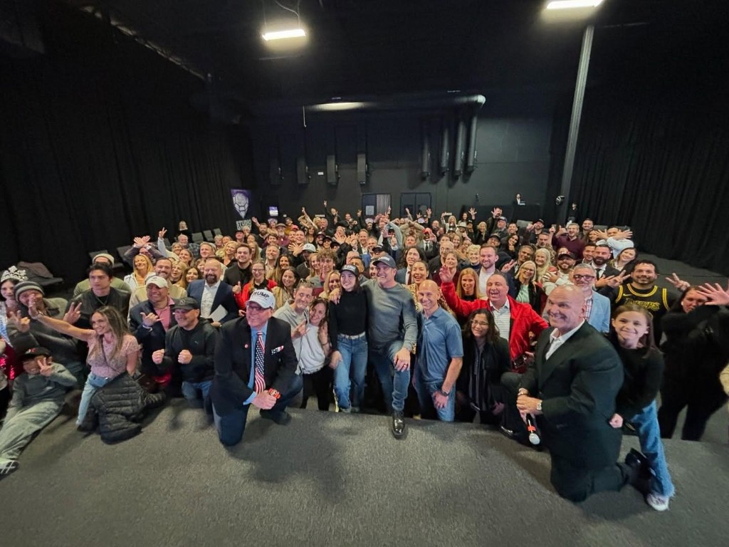 Attendees standing together at a Turning Point seminar